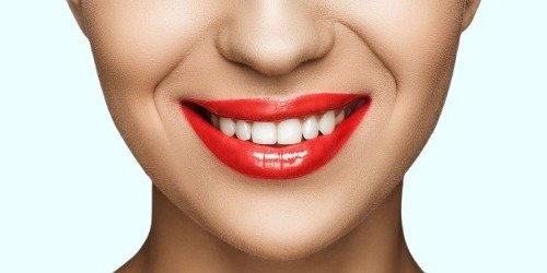 cropped-view-of-gorgeous-smiling-woman-with-red-li-2026-03-12-22-47-13-utc1-1.jpg